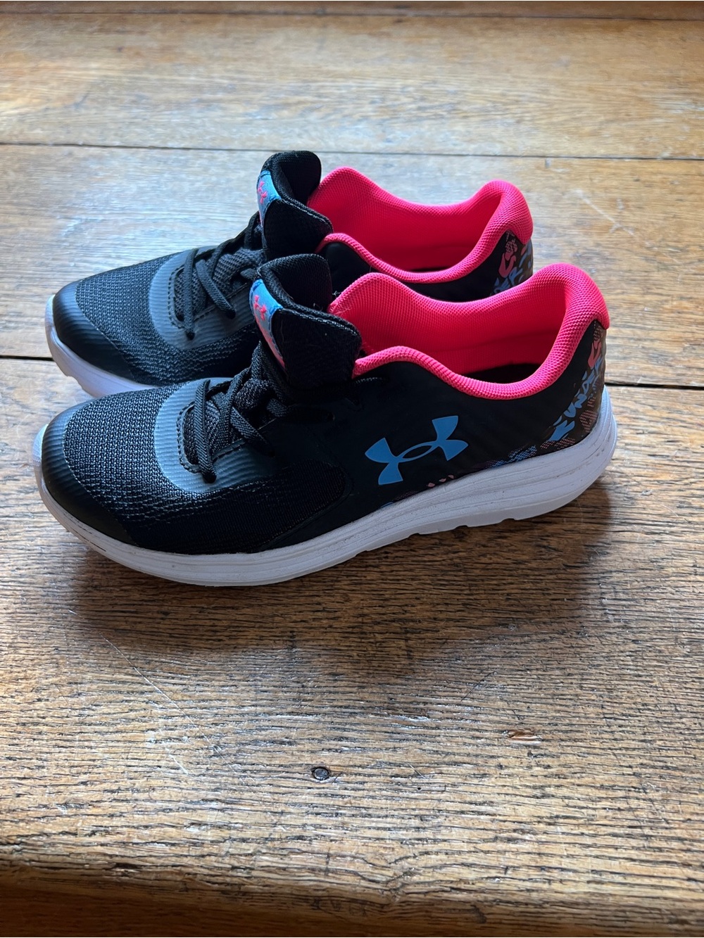 Under Armour Kids Black Sneakers with Pink Lining and Blue Logo
